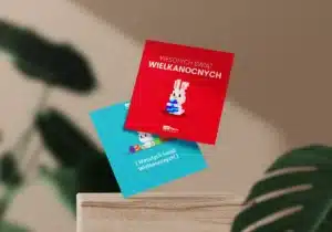 Dwie wielkanocne kartki infoShare Academy z pikselowym królikiem i życzeniami świątecznymi.